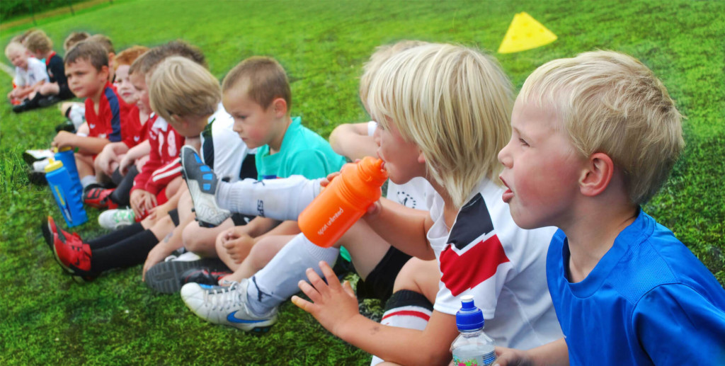 Children taking part in a football activity